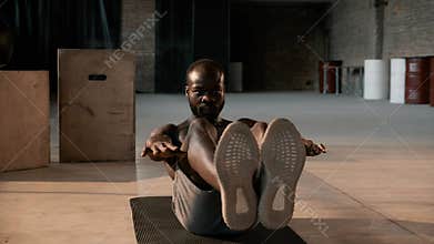 Sport man doing abs exercise workout at gym indoors. Fitness