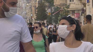 Istanbul / Turkey - 08-05-2020  corona virus. covid 19. new normal life istanbul. crowded street. masked people. Street walking, s