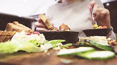 Woman eating delicious vegan bio organic food restaurant
