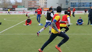 People play football in the stadium