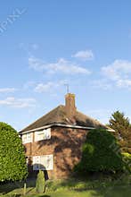 Uk House with blue sky background.