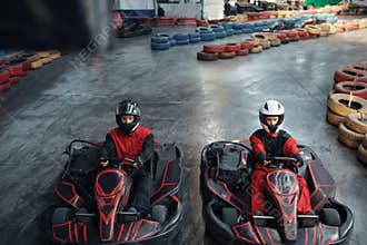 Two kart racers on start line, karting auto sport