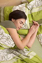 Woman smiling in sleep