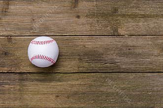 Baseball Ball On Old Wooden Table. Team sport