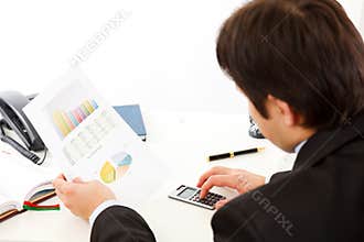 Businessman checking financial report