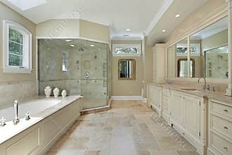 Master bath with large glass shower
