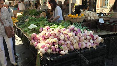 Fresh garlic for sale Cours Selaya. Close up.