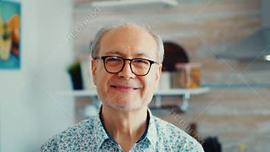 Close up of smiling senior man