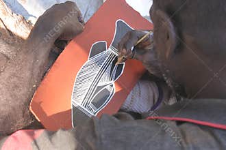 Aboriginal artist dot painting Northern Territory Australia