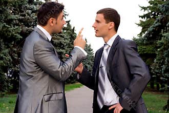 Two business men arguing