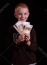 Happy kid holding euro.