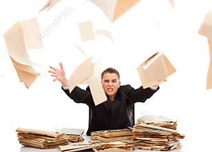 Man throwing away paperwork