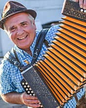 Elderly Man Playing the Accordion
