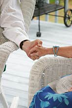 Seniors holding hands