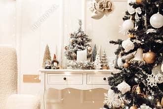 Stylish christmas living room interior with curved furniture, christmas tree and wreath, stars