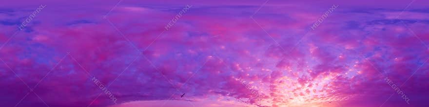 Panorama of a dark blue sunset sky with golden Cumulus clouds. Seamless hdr 360 panorama in spherical equiangular format