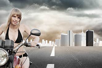 Biker girl on a motorcycle
