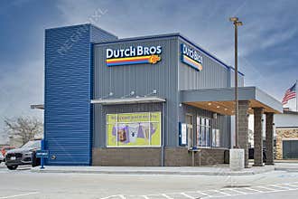 Houston, Texas USA 02-26-2023: Dutch Bros Coffee business exterior and drive-thru in Houston, TX.