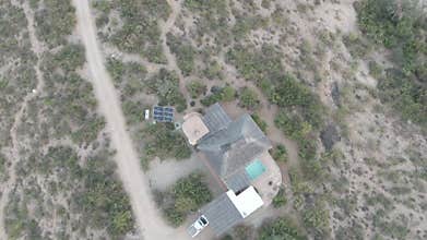 CABO PULMO BCS MEXICO-2022: An Aerial View Of A House With A Solar Panel On The Roof