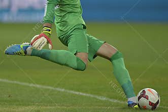 Football goalkeeper shooting ball