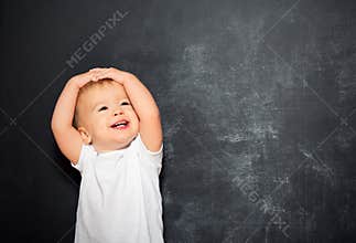 Baby child and empty Blackboard