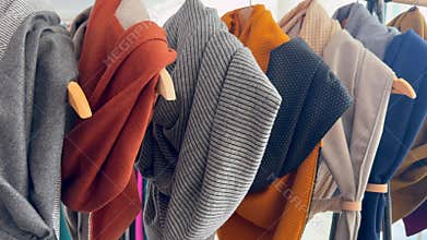 Scarves of Different Fabrics and Patterns Displayed