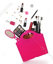 Pink shopping bag with various cosmetics