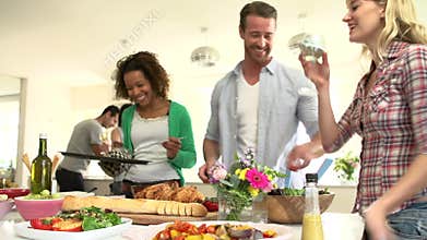 Group Of Friends Having Dinner Party At Home