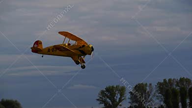 Bucker Bu 133 Jungmeister RC model performing low altitude flybys