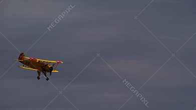 Bucker Bu 133 Jungmeister RC model in a slow flyby and climb