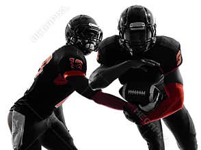 Two american football players passing play action silhouette