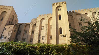 Fortified walls and towers with battlement of the Palais des Papes in Avignon, France