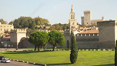 View of the Palais des Papes and the city wall in Avignon France