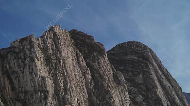 Rocky mountain peaks rotating aerial view in Huasteca region