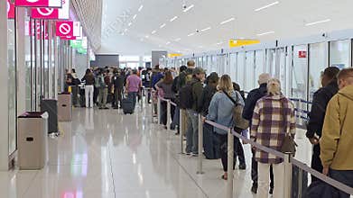 USA, April 1, 2026, Long Airport Security Queue With Delayed Travelers, Editorial video frame showing crowded checkpoint