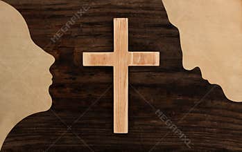 Christian couple pray concept cross wooden silhouette paper cut