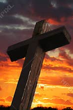 Rustic Wooden Cross Against Sunset