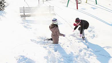 Girls having fun in snow