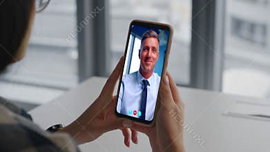 Banker video call mobile phone in office closeup. Business woman watching screen