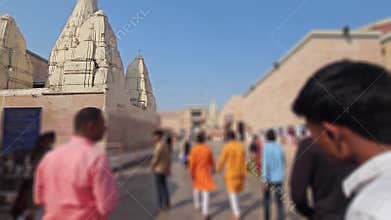 Ancient Hindu temple structures in old Varanasi city streets with traditional architecture