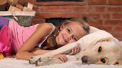 Happy girl relaxing with her dog