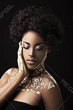 Afro-American girl with golden patterns
