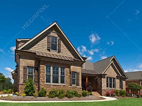Model Luxury Home Exterior angle view sidewalk