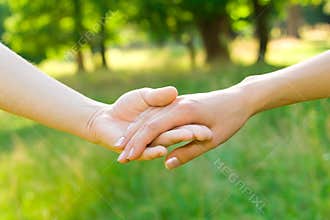 Love and friendship concept - hands