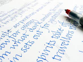 Calligraphy pen and writing on paper