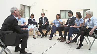 Members Of Medical Staff In Meeting Together
