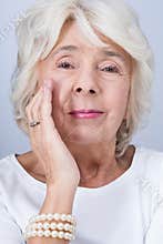 Woman and working anti-aging cream