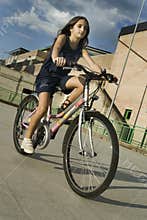Girl riding bicycle