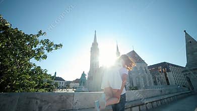 Young Man Borne on the Shoulders of a Woman Spinning Smile Matthias Church Background