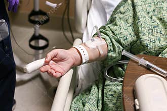 Patient's arm with gauze wrapped finger